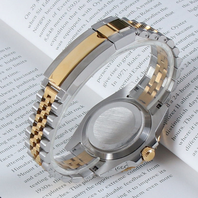 Traveler GMT Automático – Black Gold Steel Jubilee NH34