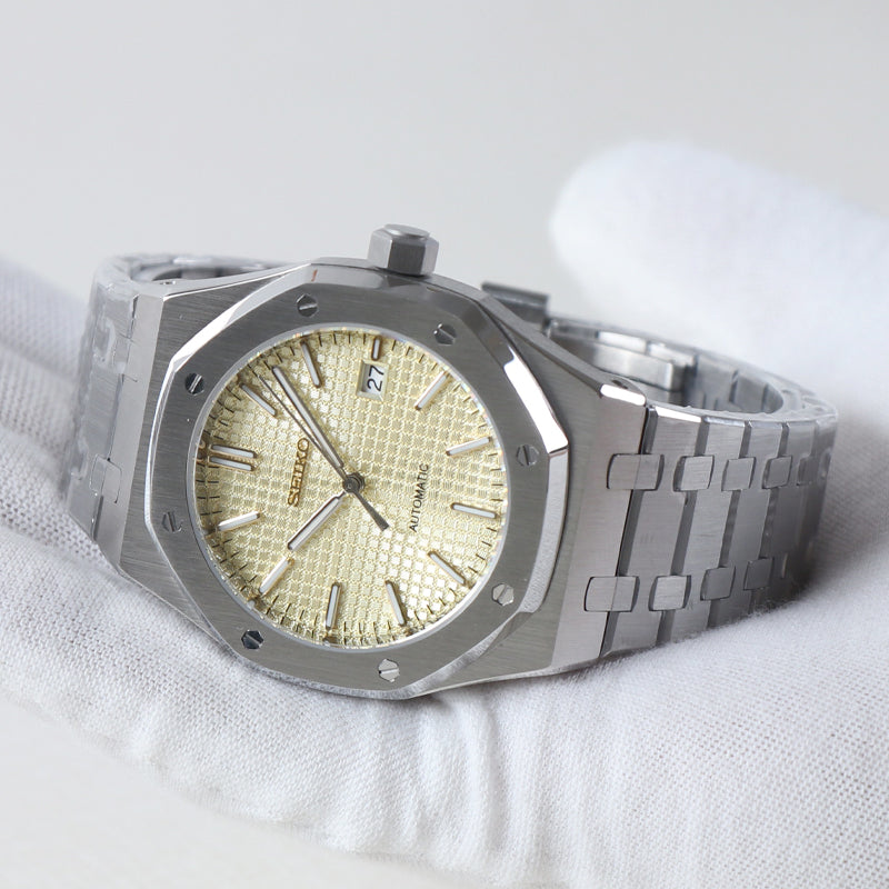 Sport Automático Oak – Champagne Textured Dial Steel NH35
