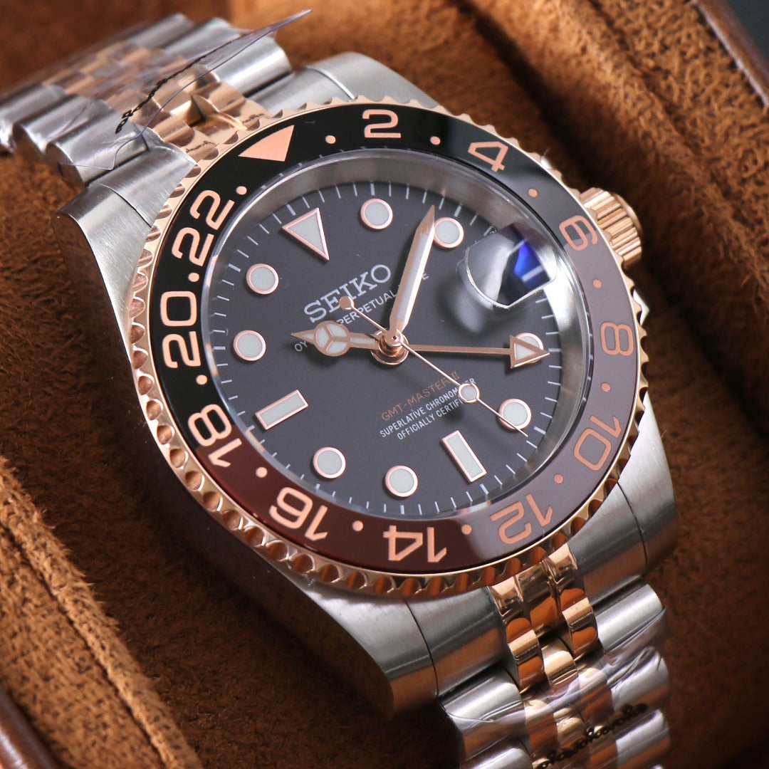 Traveler GMT Automático – Black Brown Steel NH34