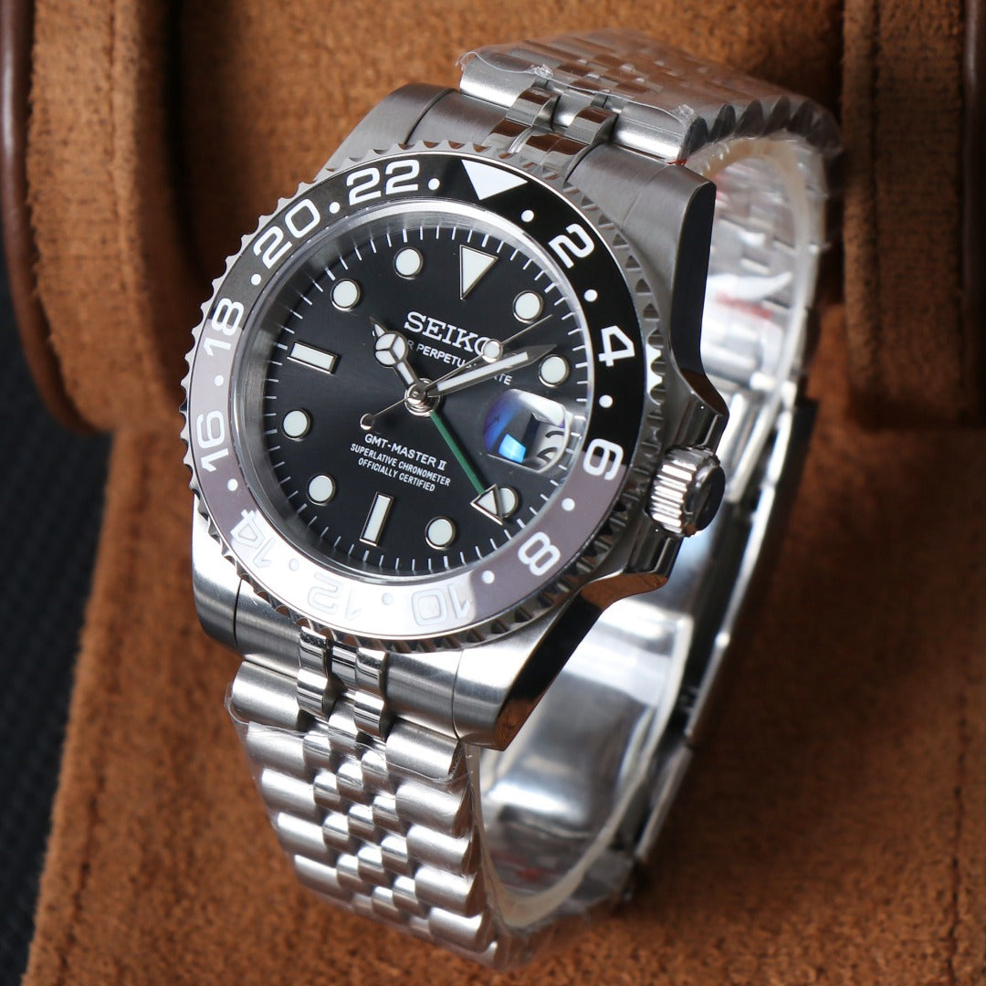 Travel GMT Automático – Black Grey Bezel Steel NH34